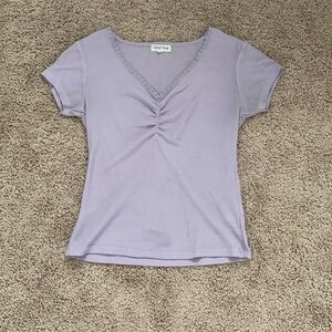 This is a super cute unbranded purple t-shirt.